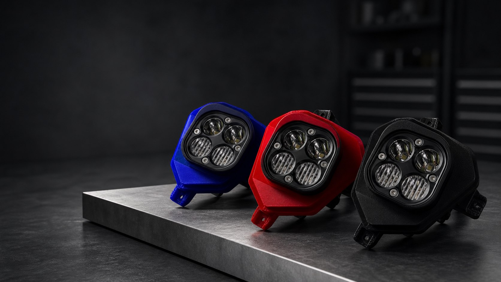 Concept campaign of blue, red and black angular four-projector headlight assemblies
